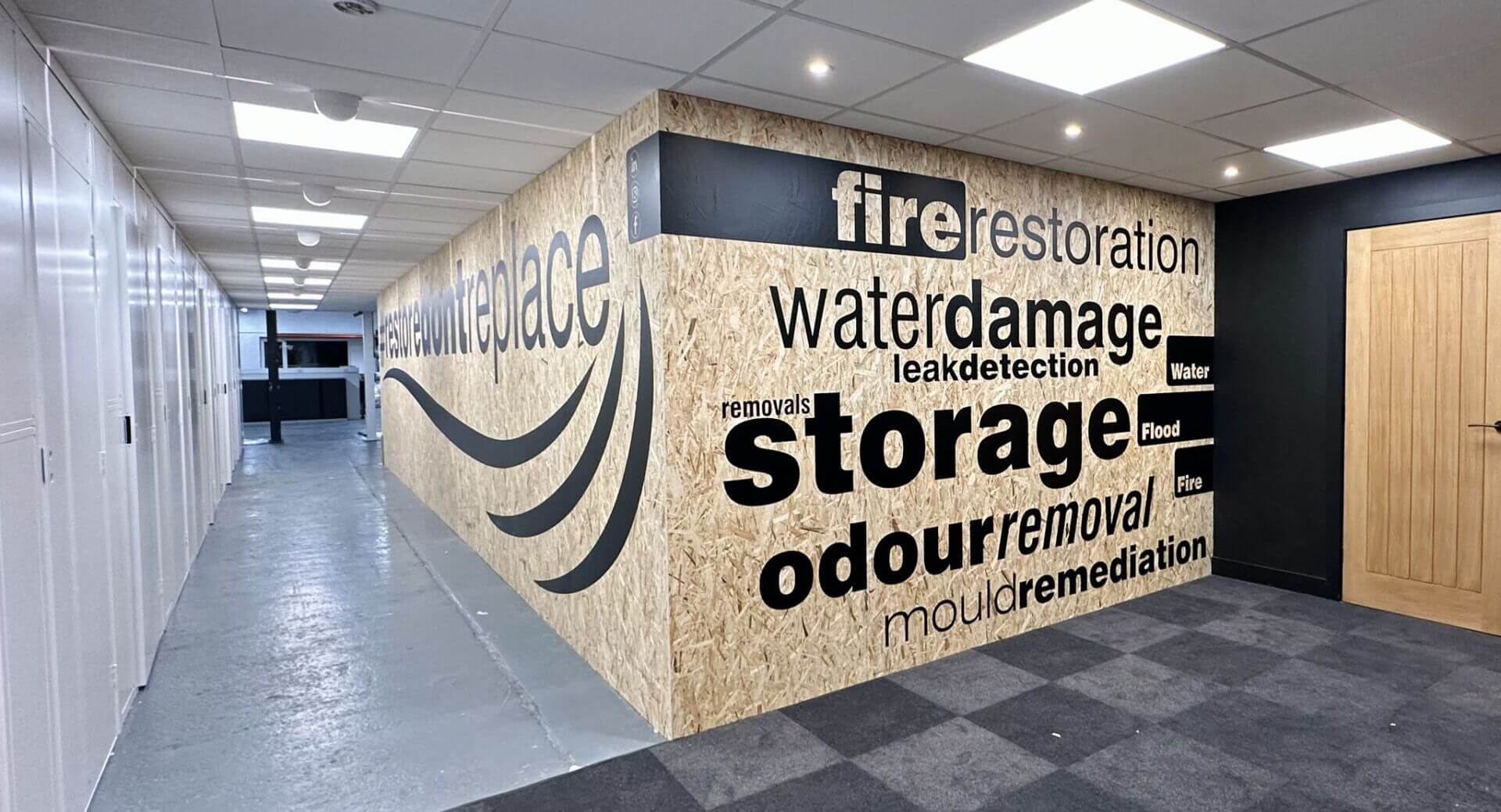 Suspended ceiling installations at office with fire restoration walls