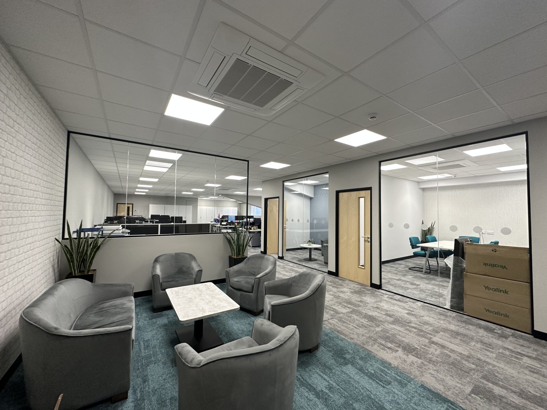 seating area with partition in modern office low picture shot of mezzanine floor installed in a warehouse